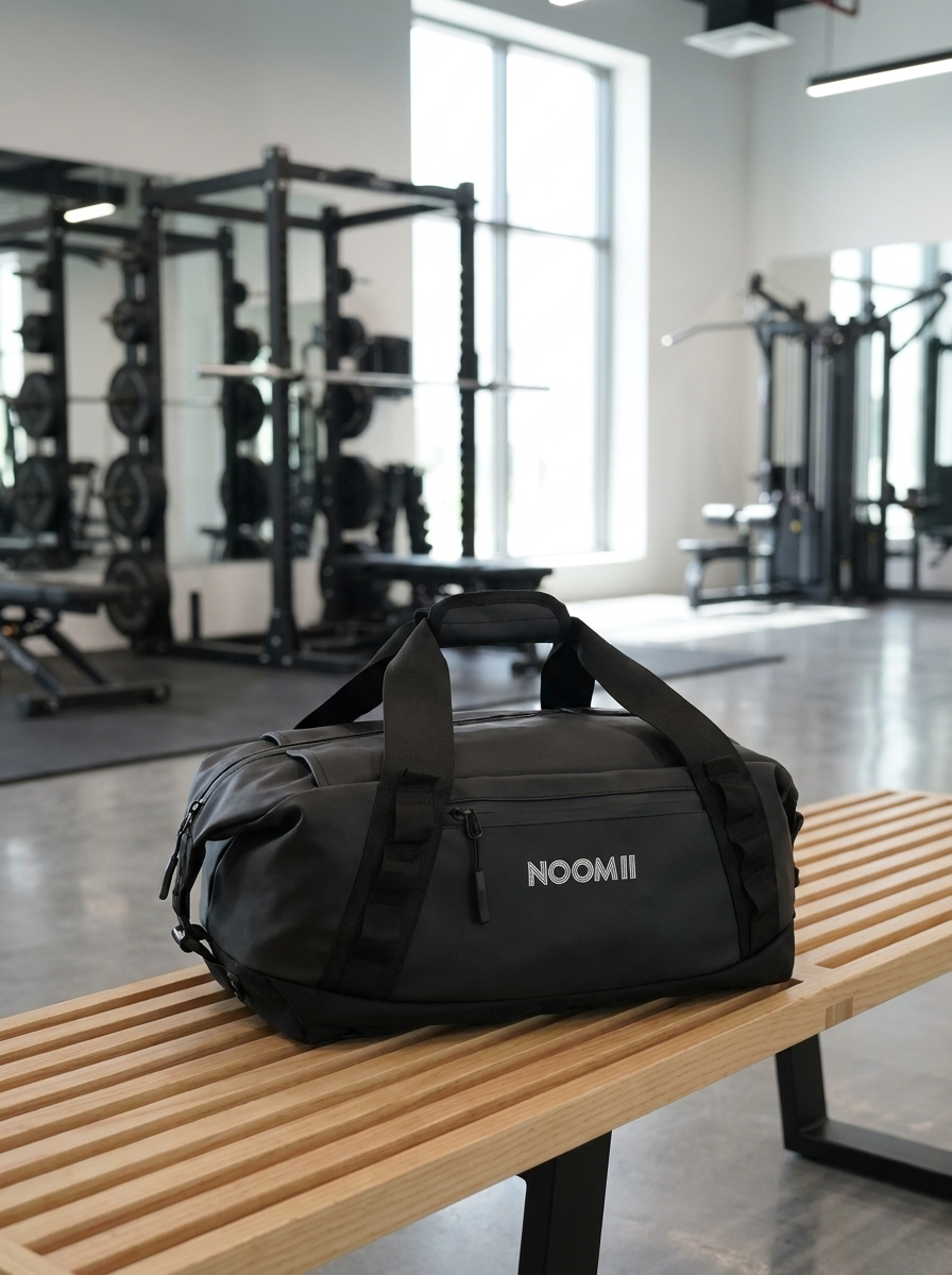 NooMii 2-in-1 gym bag on a bench in a bright modern UAE gym